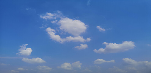Cumulus white clouds in the blue sky natural background beautiful nature space for write