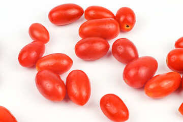 Cherry tomatoes isolated on white background