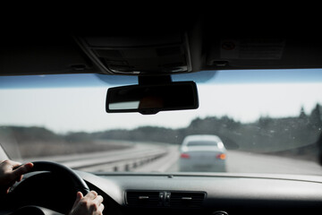 Rear view mirror inside the car.