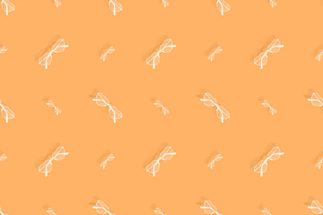Glasses seamless pattern. Background from glasses for sight on a bright background. 