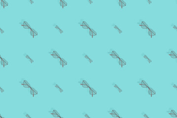 Fototapeta premium Glasses seamless pattern. Background from glasses for sight on a bright background. 