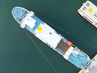 Aerial Shot of Hermes Corfu Lines Cruise Ship Docked In Port Of Igoumenitsa City In Greece....