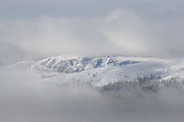Obraz na płótnie Canvas view of a ski resort above the clouds during holiday