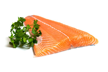 Fillet of salmon meat with parsley isolated on white background. Cut of a fish carcass.