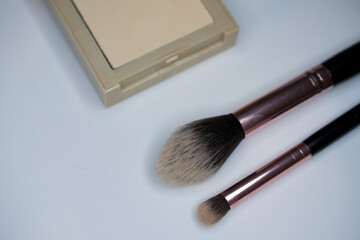 makeup brushes and powder