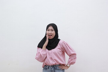 Young muslim women feel amazed by what they see. Young muslim women seemed mesmerized and then said "wow". Beautiful asian woman with casual dress. Beautiful muslim women.