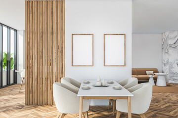 Bright modern dining room interior with large sofa
