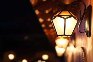 Fototapeta na wymiar retro lights on street at dark night
