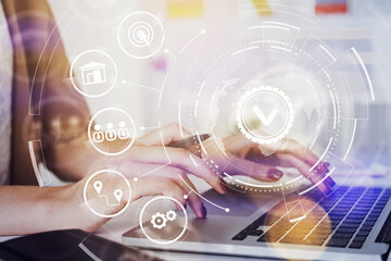 Businesswoman hands in office workplace working with laptop conducting a research to optimize...