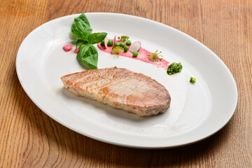Healthy grilled tuna steak on the plate