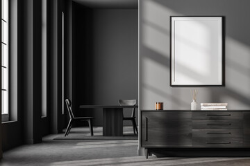 Dark living room interior with windows, two chairs and poster