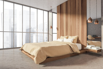 Grey and wooden bedroom interior with bed, window and workplace