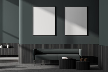 Dark living room interior with two empty white poster