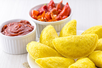 fried pastry of corn dough typical of Brazil