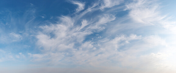 wide panorama of the sky with feather clouds at daytime