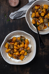 homemade pumpkin gnocchi with mushroom sauce and ricotta