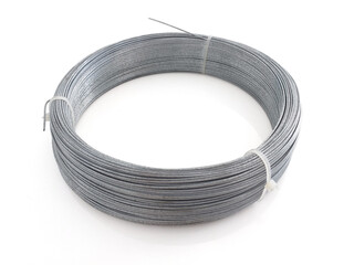 Silver wire coil isolated on white background. Aerial view of Industry Coil of galvanized wire for blinds and windows. Hardware and Masonry Material pattern. - obrazy, fototapety, plakaty