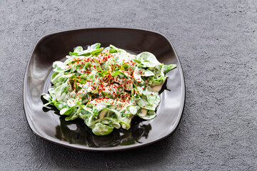 Purslane salad is a type of salad. Purslane salad is a healthy food source. It is a type of salad used in diets.