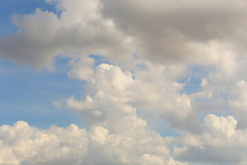 Fototapeta na wymiar Blue sky with white clouds in the daytime background.