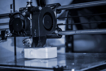 3D printer printing black shapes close-up Automatic three dimensional 3d printer
