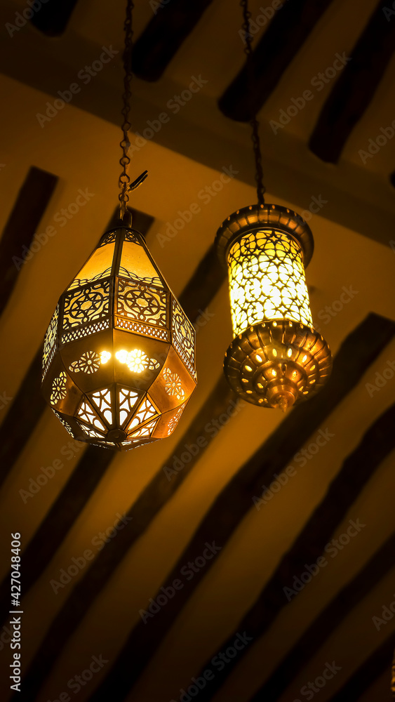 Wall mural Lantern decor. Ramadan Kareem concept. Dark background. Selective focus.