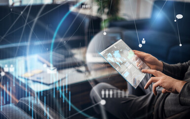 Male hands with futuristic transparent digital tablet. Modern businessman working remotely. Double exposure, global network concept