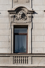 Windows on old city facades, with decorative elements