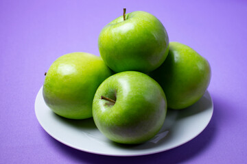 green apples on a plate