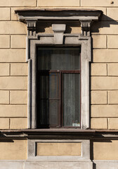 Windows on old city facades, with decorative elements