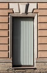 Windows on old city facades, with decorative elements