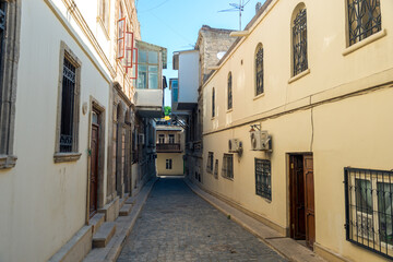 Empty street in old city Icheri Sheher of Baku, Azerbaijan. Architecture of Old city Baku. Inner City buildings.