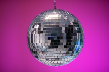 Disco Ball party music event equipment on pink wall