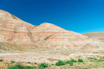 Cross-bedding in Candy Cane Mountains in Azerbaijan. Colorful stripes of the hills. Shale striped mountains.
