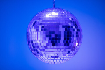Fototapeta na wymiar Shining Disco Ball isolated on blue