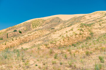 Fototapeta na wymiar Sand dune dune Sarikum in Dagestan, Russia