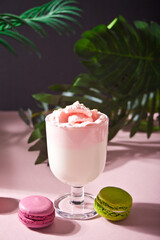 Glass of strawberry iced Dalgona whipped drink coffee