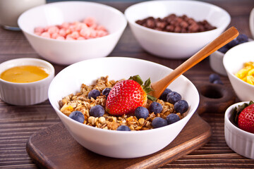 Healthy breakfast. Granola, muesli with fresh berries.