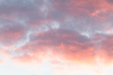 Naklejka na ściany i meble beautiful fluffy clouds, purple summer sunset 