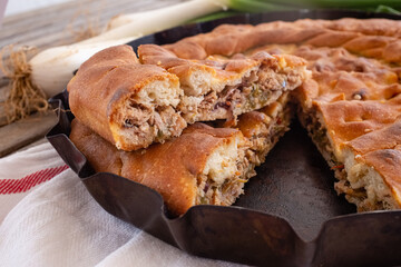 Calzone filled of onion and tuna - Traditional stuffed pizza of Puglia