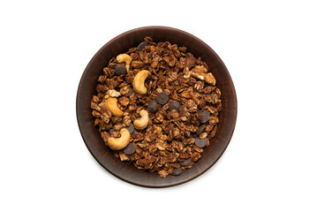 Chocolate granola cereal with nuts in a bowl background.