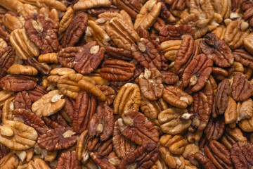 Tasty pecan-nut background. Top view.