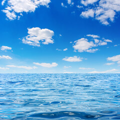 Fototapeta na wymiar Photo of blue clear bay waves with sky and clouds