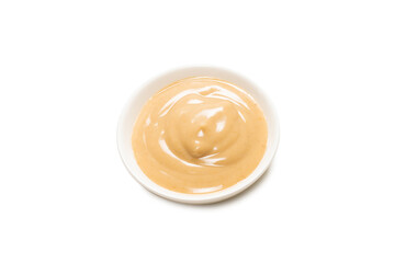 Mushroom sauce in a bowl isolated on white background.