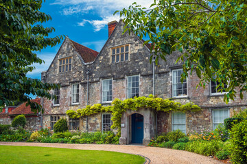 medieval stone building of the Diocesan offices, Winchester, Cathedral Close, Hampshire, England