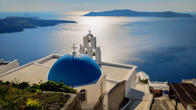 The famous Three bells of Fira - Powered by Adobe