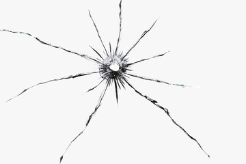Texture of cracks on the glass from the shot. Cracked glass for design. Cracks on a white background
