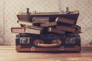 Vintage suitcase full of old books
