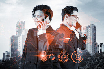 Businessman and businesswoman as a part of corporate team processing conference call to protect clients confidential information at cybersecurity compliance division. IT lock icons over Bangkok.