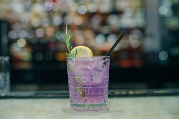 purple bar cocktail of lemon and ice