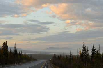 The landscape of the high Khibiny mountains in the fog on the way to Kirovsk. Murmansk region. Khibiny. Kola Peninsula.